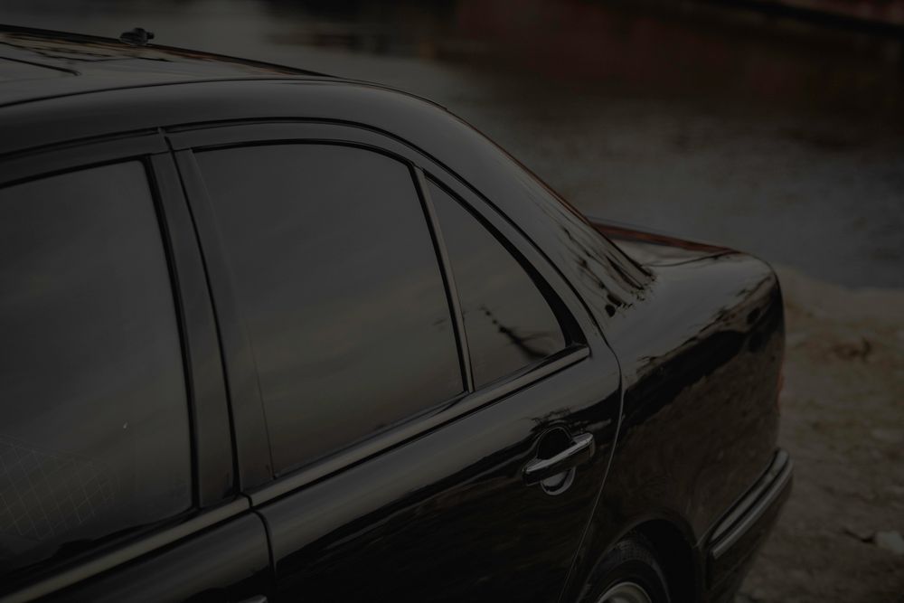 Side windows of a car with dark window tint